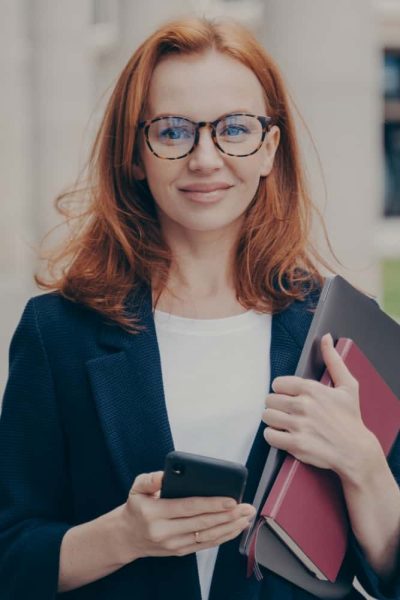 confident-beautiful-red-haired-female-business-con-2021-12-09-05-58-20-utc-min.jpg